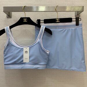 Alo Yoga solid color sports bra with logo + sports skirt, size S